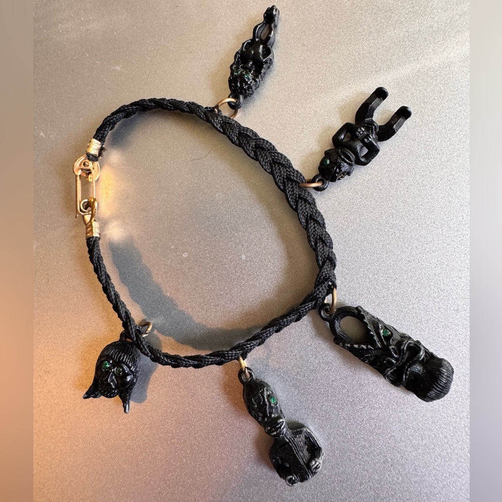 Vintage braided charm bracelet w black mimi tiki figures